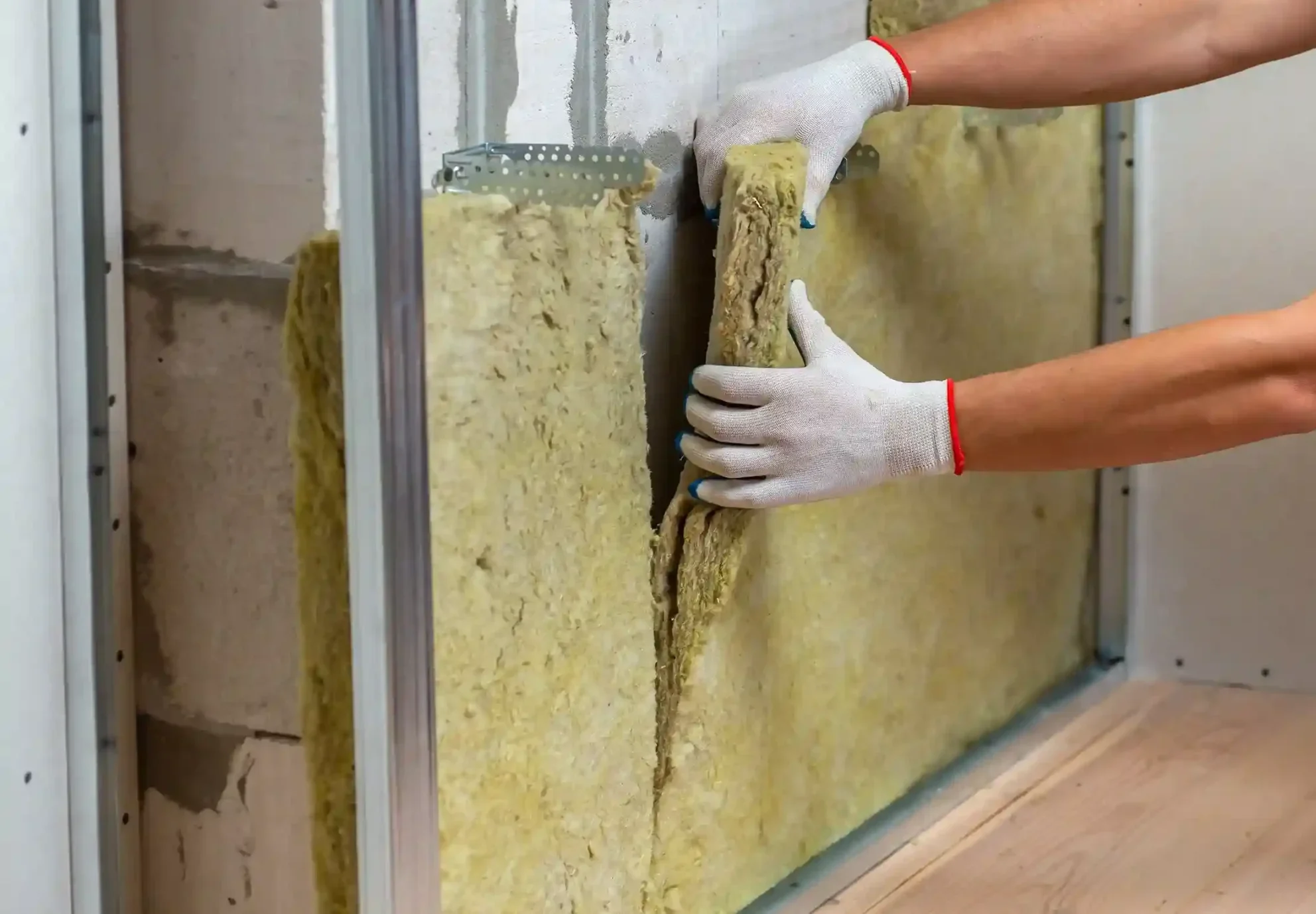 worker insulating a room wall with mineral rock wo 2024 12 06 04 20 19 utc 66 11zon scaled e1755251482961